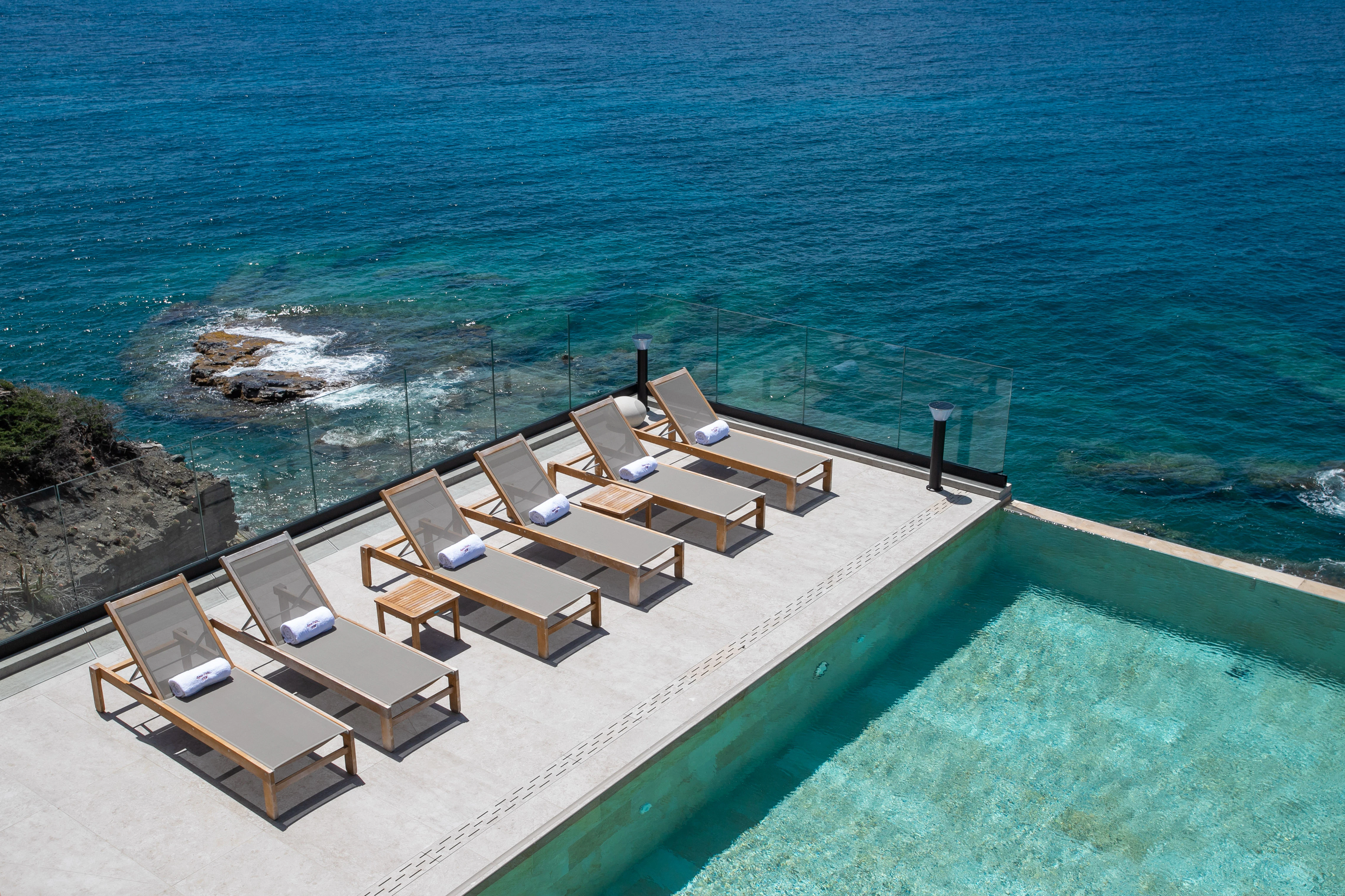 26 Pool And Sun Chairs From Balcony With Panoramic View in St. Martin